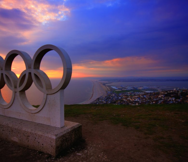 olympic-rings-statue-on-coast